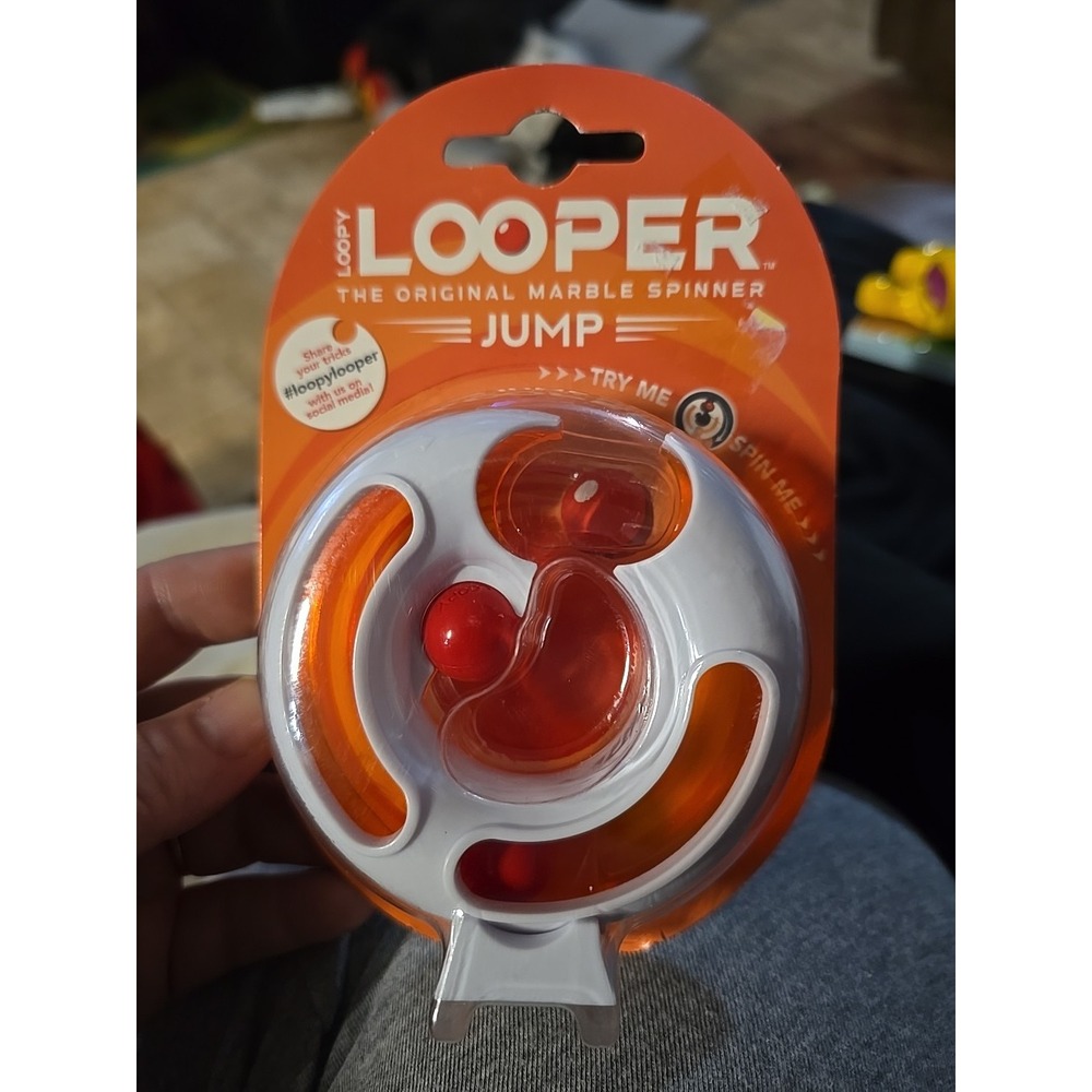Orange Loopy Looper Jump- The Original Marble Spinner Skill Fidget LP2207 NIPS